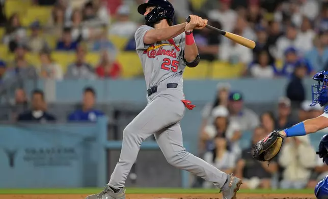 St. Louis Cardinals' Thomas Saggese hits a solo home run during the second inning of a baseball game against the Los Angeles Dodgers, Tuesday, Sept. 1, 2026, in Los Angeles. (AP Photo/Jayne Kamin-Oncea)