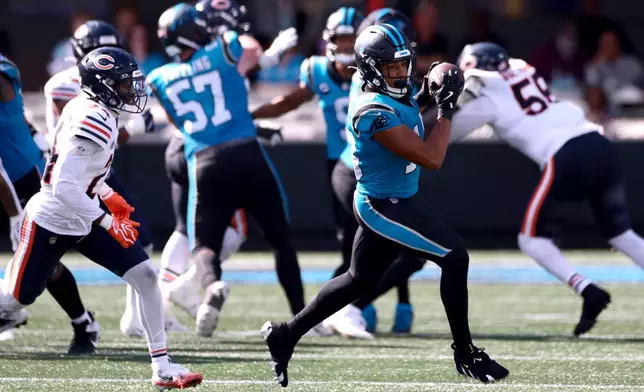 Carolina Panthers wide receiver Jalen Coker (18) makes a catch during the second half of an NFL football game, Sunday, Sept. 13, 2026, in Charlotte, N.C. (AP Photo/Scott Kinser)