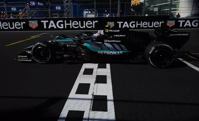 Mercedes driver Andrea Kimi Antonelli of Italy crosses the finish line to win the Spanish Formula One Grand Prix race in Madrid, Sunday, Sept. 13, 2026. (AP Photo/Manu Fernandez)