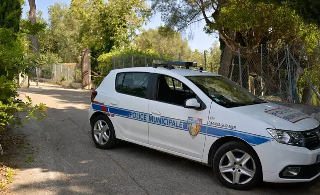 A police car is parked in front of the Renoir Museum after thieves stole four valuable Renoir paintings, in Cagnes-sur-Mer, Tuesday, Sept. 8, 2026. (AP Photo/Philippe Magoni)