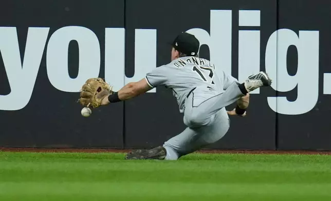 Chicago White Sox left fielder Sam Antonacci (17) can't get to the ball on a game winning double hit by Cleveland Guardians' Brayan Rocchio in the ninth inning of a baseball game in Cleveland, Tuesday, Sept. 15, 2026. (AP Photo/Sue Ogrocki)
