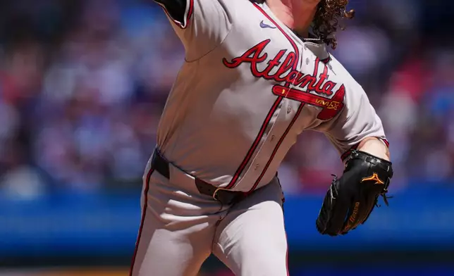 Atlanta Braves pitcher Grant Holmes throws during the first inning of a baseball game against the Philadelphia Phillies, Monday, Sept. 7, 2026, in Philadelphia. (AP Photo/Derik Hamilton)