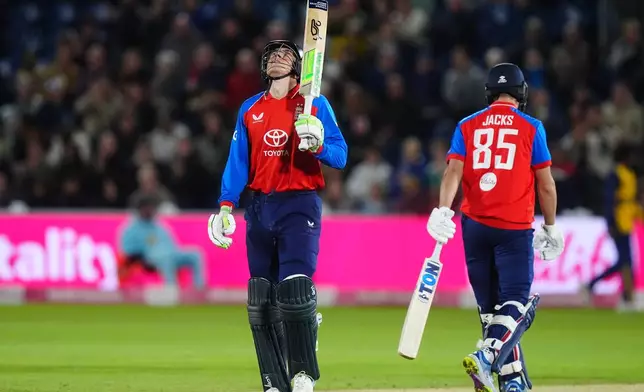 England's Tom Banton celebrates reaching 50 runs during the second IT20 match between England and Sri Lanka in Cardiff, Wales, Thursday Sept. 17, 2026. (David Davies/PA via AP)