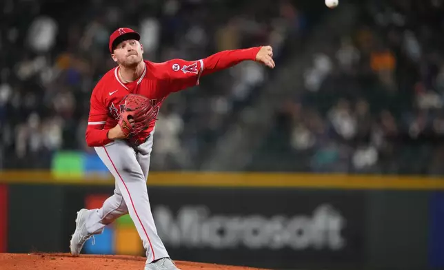 Los Angeles Angels starting pitcher Reid Detmers throws against the Seattle Mariners during the first inning of a baseball game, Friday, Sept. 25, 2026, in Seattle. (AP Photo/Lindsey Wasson)