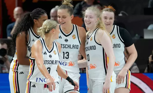 German players react during the Women's Basketball World Cup match between Germany and Japan in Berlin, Saturday, Sept. 5, 2026. (AP Photo/Ebrahim Noroozi)