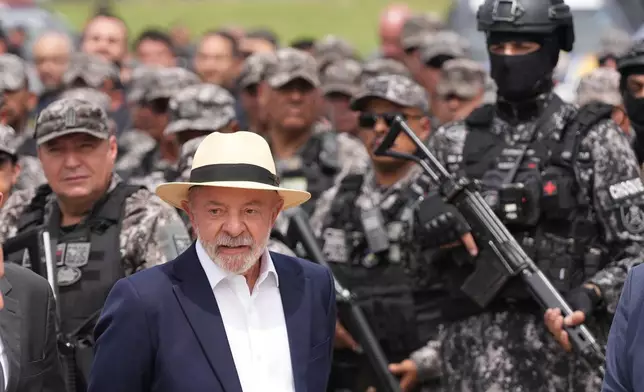 Brazilian President Luiz Inacio Lula da Silva arrives for a ceremony to announce a new security plan to combat organized crime in Rio de Janeiro, Friday, Sept. 18, 2026. (AP Photo/Silvia Izquierdo)