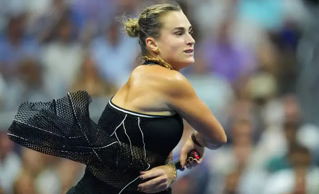 Aryna Sabalenka, of Belarus, follows through on a shot to Jessica Pegula, of the United States, during the women's singles semifinals of the U.S. Open tennis championships Thursday, Sept. 10, 2026, in New York. (AP Photo/Kirsty Wigglesworth)