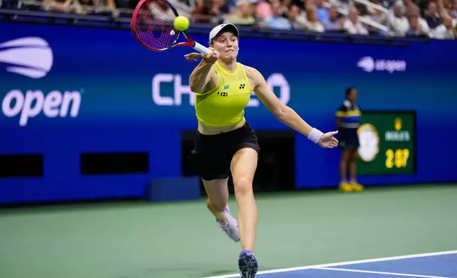 Elena Rybakina, of Kazakhstan, returns the ball to Coco Gauff, of the United States, during the women's singles semifinals of the U.S. Open tennis championships, Thursday, Sept. 10, 2026, in New York. (AP Photo/Seth Wenig)
