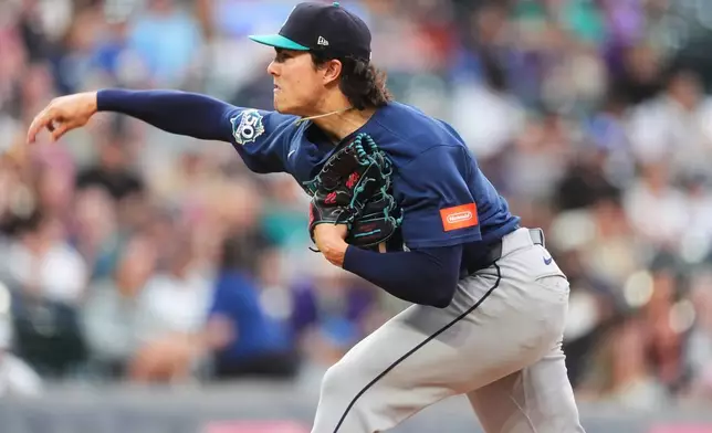 Seattle Mariners starting pitcher Bryan Woo works against the Colorado Rockies in the first inning of a baseball game Friday, Sept. 18, 2026, in Denver. (AP Photo/David Zalubowski)