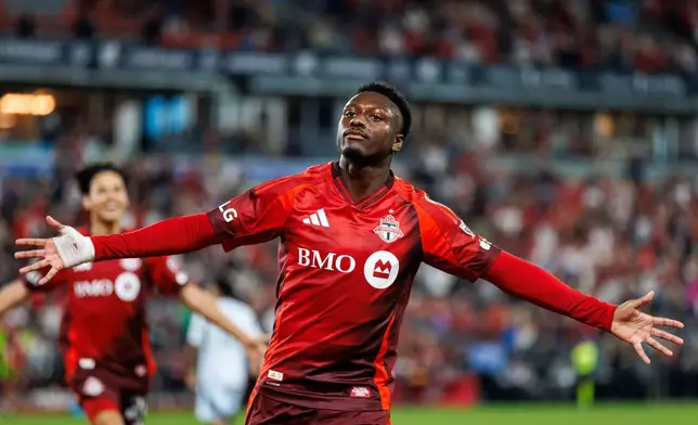 Toronto FC's Derrick Etienne Jr. (11) celebrates his goal against Chicago Fire FC during the second half of a soccer match in Toronto, Saturday, Sept. 5, 2026. (Keito Newman/The Canadian Press via AP)
