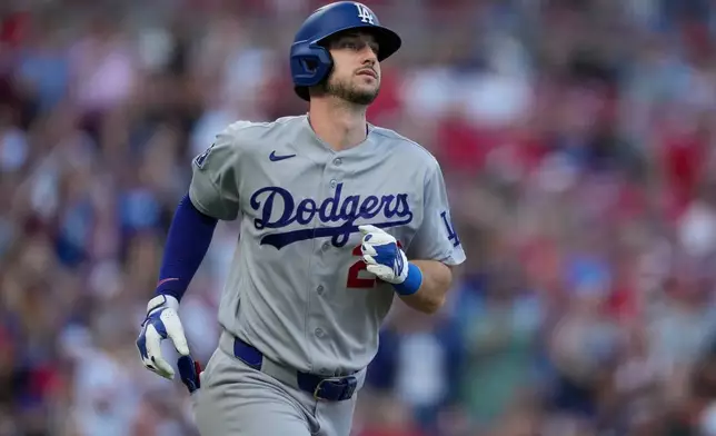 Los Angeles Dodgers right fielder Kyle Tucker rounds the bases after hitting a solo home run during the second inning of a baseball game against the Cincinnati Reds, Monday, Sept. 14, 2026, in Cincinnati. (AP Photo/Carolyn Kaster)