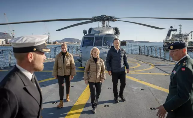Denmark’s Prime Minister Mette Frederiksen, second left, European Commission President Ursula von der Leyen, center, and Greenlandic Prime Minister Jens-Frederik Nielsen, second right, visit a ship, Thetis in Nuuk, Greenland Sunday, Sept. 6, 2026. (Mads Claus Rasmussen/Ritzau Scanpix via AP)