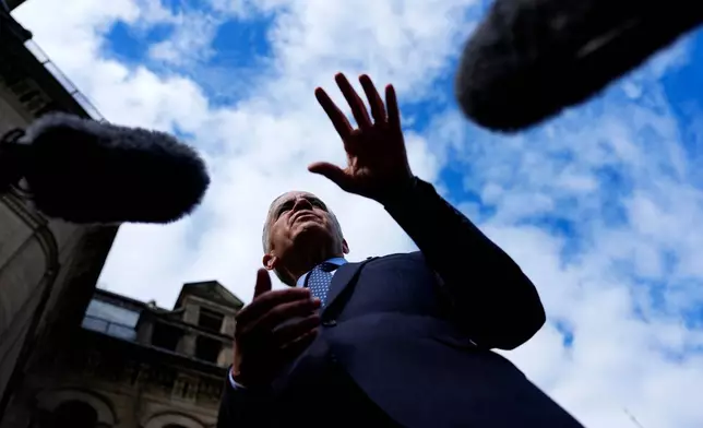 Prime Minister Mark Carney speaks to journalists as he arrives at the Office of the Prime Minister and Privy Council in Ottawa, Canada, Tuesday, Sept. 1, 2026. (Justin Tang/The Canadian Press via AP)