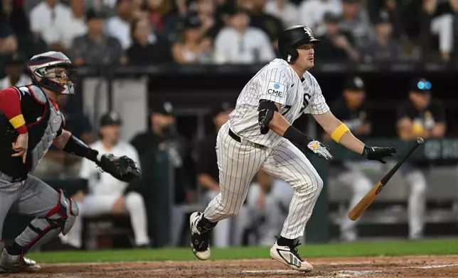 Chicago White Sox's Sam Antonacci, right, watches his two-run double during the sixth inning of a baseball game against the Minnesota Twins, Sunday, Sept. 6, 2026, in Chicago. (AP Photo/Paul Beaty)