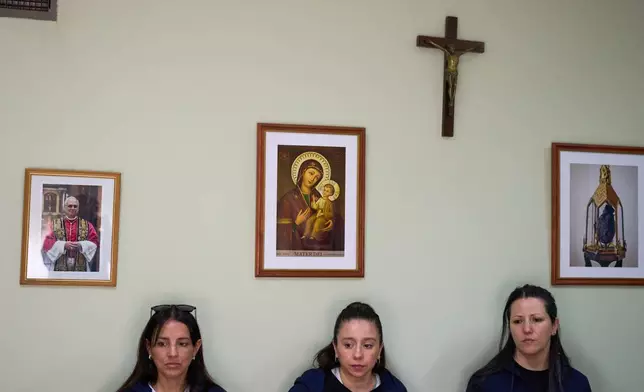 Employees attend a meeting at the Pequeño Cottolengo Don Orione, a home for people with disabilities that will be visited by Pope Leo XIV in November, in Buenos Aires, Argentina, Thursday, Sept. 24, 2026. (AP Photo/Rodrigo Abd)