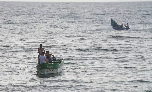 Fishermen wait to catch fish near Sirah fish market in Aden, Yemen, Tuesday, Sept. 15, 2026. (AP Photo/Abdulnasser Alseddik)