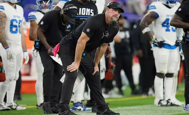 Detroit Lions head coach Dan Campbell watches against the Buffalo Bills during the first half of an NFL football game in Orchard Park, N.Y., Thursday, Sept. 17, 2026. (AP Photo/Sue Ogrocki)
