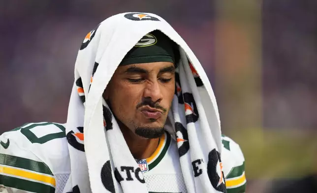 Green Bay Packers quarterback Jordan Love walks off the field after an NFL football game against the Minnesota Vikings, Sunday, Sept. 13, 2026, in Minneapolis, Minn. (AP Photo/Abbie Parr)