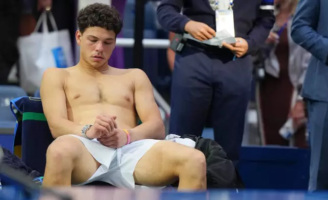 Ben Shelton, of the United States, reacts after he lost the men's singles final of the U.S. Open tennis championships against Alexander Zverev, of Germany, Sunday, Sept. 13, 2026, in New York. (AP Photo/Kirsty Wigglesworth)