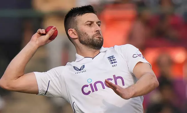 FILE - England's Mark Wood bowls a delivery during the second day of the first cricket test match between England and India in Hyderabad, India, Friday, Jan. 26, 2024. (AP Photo/Mahesh Kumar A., File)