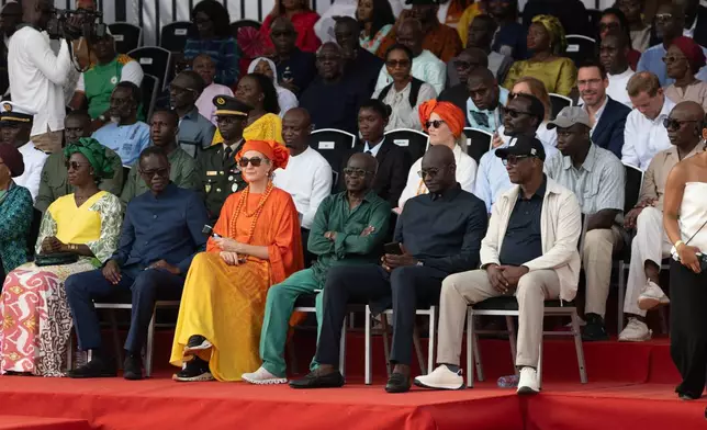 Officials attend an Olympic torch lighting ceremony, ahead of the Dakar 2026 Youth Olympic Games, in Dakar, Senegal, Saturday, Sept. 12, 2026. (AP Photo/Sylvain Cherkaoui)