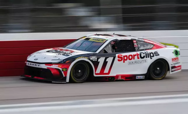 Denny Hamlin steers down the front stretch during a NASCAR Cup Series auto race Sunday, Sept. 6, 2026, in Darlington, S.C. (AP Photo/Matt Kelley)