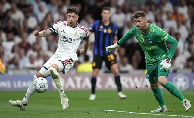 Real Madrid's Federico Valverde scores his side's second goal during a Champions League soccer match between Real Madrid and Inter Milan in Madrid, Spain, Tuesday, Sept. 8, 2026. (AP Photo/Bernat Armangue)
