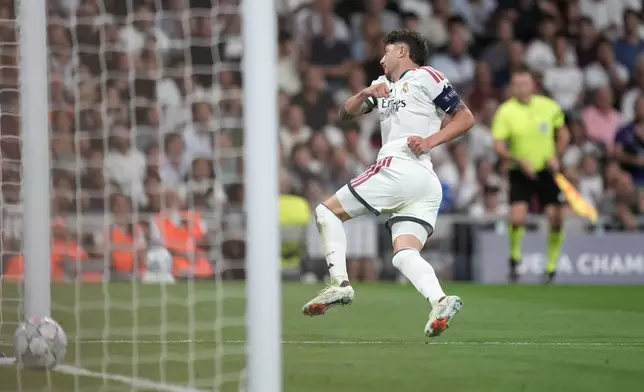 Real Madrid's Federico Valverde scores his side's second goal during a Champions League soccer match between Real Madrid and Inter Milan in Madrid, Spain, Tuesday, Sept. 8, 2026. (AP Photo/Bernat Armangue)