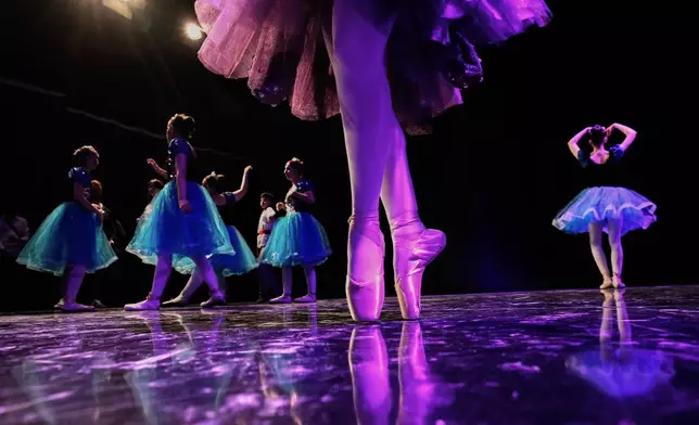 Students from the Baghdad Ballet Academy prepare to perform in a production titled "Mermaid" at Al-Sinbad Theater in Baghdad, Iraq, Friday, Sept. 25, 2026. (AP Photo/Hadi Mizban)