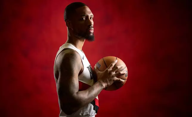 Portland Trail Blazers guard Damian Lillard poses for a photo during the NBA basketball team's media day in Portland, Ore., Monday, Sept. 28, 2026. (AP Photo/Craig Mitchelldyer)