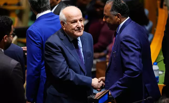 Palestinian Ambassador to the United Nations Riyad Mansour, left, arrives ahead of the 81st session of the United Nations General Assembly at United Nations headquarters, Tuesday, Sept. 22, 2026. (AP Photo/Yuki Iwamura)