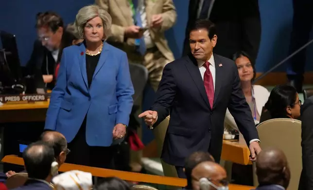 United States Secretary of State Marco Rubio, right, and White House Chief of Staff Susie Wiles prepare to listen to remarks from President Donald Trump during the 81st session of the United Nations General Assembly at United Nations headquarters, Tuesday, Sept. 22, 2026. (AP Photo/Seth Wenig)