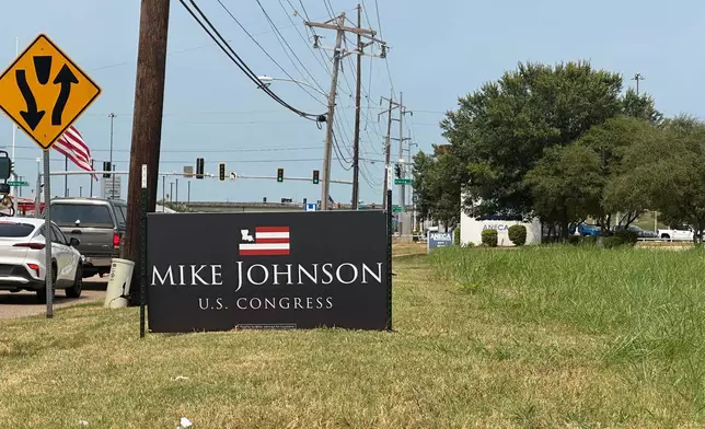 A campaign sign in support of House Speaker Mike Johnson is pictured Wednesday, Aug. 26, 2026, in Benton, La. (AP Photo/Lisa Mascaro)