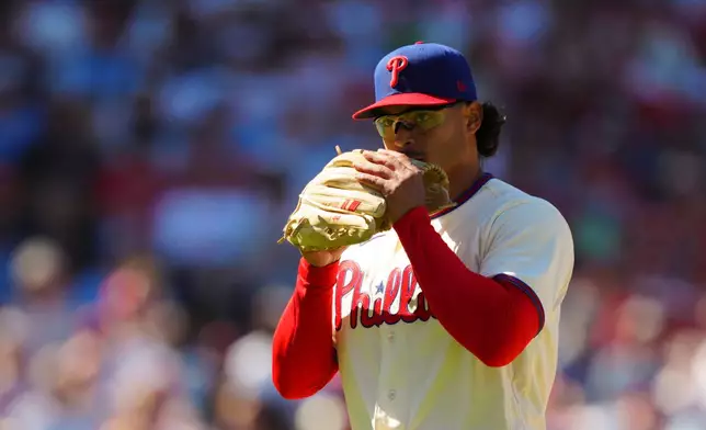 Philadelphia Phillies pitcher Jesús Luzardo walks off the mound after striking out Atlanta Braves' Austin Riley during the eighth inning of a baseball game, Monday, Sept. 7, 2026, in Philadelphia. (AP Photo/Derik Hamilton)