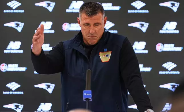 New England Patriots head coach Mike Vrabel answers questions during a media availability prior to an NFL football practice, Wednesday, Sept. 16, 2026, in Foxborough, Mass. (AP Photo/Charles Krupa)