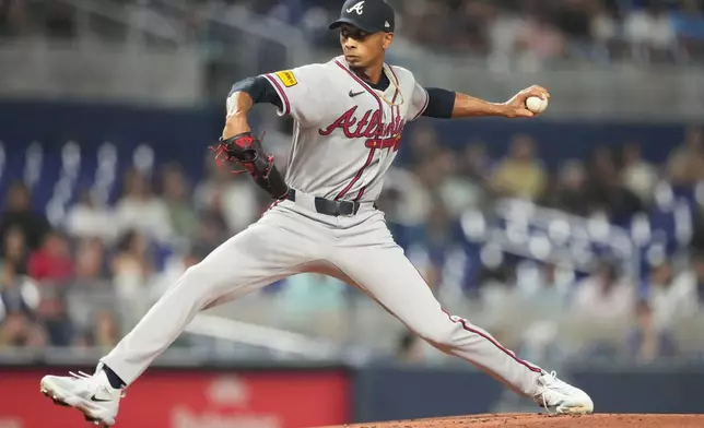 Atlanta Braves starting pitcher Ray Kerr throws during the first inning of a baseball game, against the Miami Marlins, Friday, Sept. 25, 2026, in Miami. (AP Photo/Lynne Sladky)