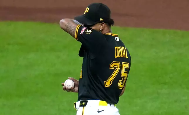 Pittsburgh Pirates pitcher Camilo Doval collects himself on the mound during the seventh inning of a baseball game against the Kansas City Royals in Pittsburgh, Saturday, Sept. 19, 2026. (AP Photo/Gene J. Puskar)