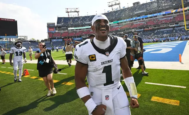 Philadelphia Eagles quarterback Jalen Hurts walks off the field after an NFL football game against the Tennessee Titans, Sunday, Sept. 20, 2026, in Nashville, Tenn.(AP Photo/John Amis)