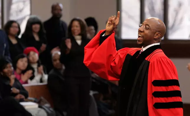 FILE - The Rev. Raphael Warnock delivers a sermon during a church service at Ebenezer Baptist Church in Atlanta on Sunday Jan. 18, 2009. (AP Photo/John Amis, File)