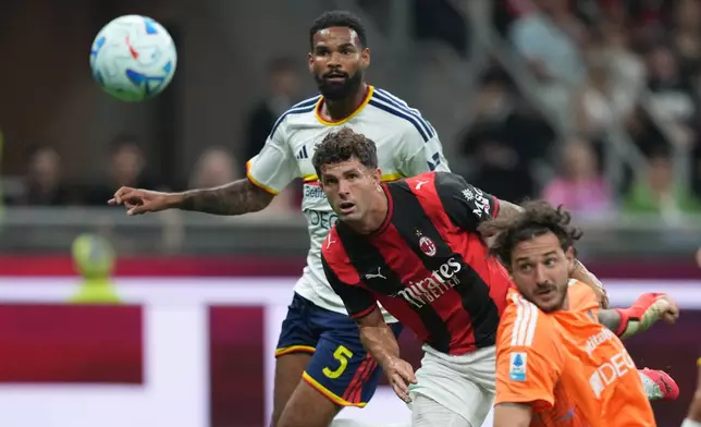 AC Milan's Christian Pulisic scores their opening goal during the Serie A soccer match between AC Milan and Lecce, in Milan, Italy, Sunday, Sept. 20, 2026. (AP Photo/Antonio Calanni)
