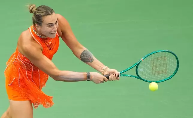 Aryna Sabalenka, of Belarus, returns the ball to Taylor Townsend, of the United States, during the fourth round of the U.S. Open tennis championships Sunday, Sept. 6, 2026, in New York. (AP Photo/Yuki Iwamura)