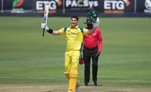 Australia's batsman Matt Renshaw celebrates his century during the first One Day International cricket match between Zimbabwe and Australia in Harare, Zimbabwe, Tuesday, Sept.15, 2026. (AP Photo/Wonder Mashura)