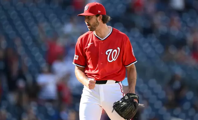 Washington Nationals relief pitcher Jack Sinclair reacts at the end of a baseball game against the Los Angeles Angels, Sunday, Sept. 13, 2026, in Washington. (AP Photo/Nick Wass)
