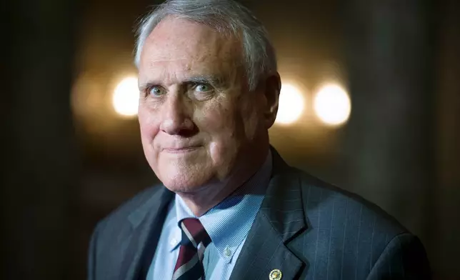 FILE - Sen. Jon Kyl, R-Ariz., waits to be sworn-in by Vice President Mike Pence during his ceremonial swearing-in at the Old Senate Chamber on Capitol Hill, in Washington, Sept. 5, 2018. (AP Photo/Cliff Owen, File)