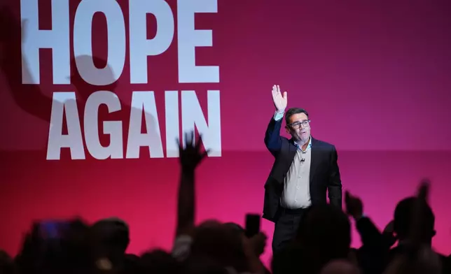 Britain's Prime Minister Andy Burnham waves after he delivered his Leader's Speech during the Labour Party Conference in Liverpool, England, Tuesday, Sept. 29, 2026. (AP Photo/Jon Super)