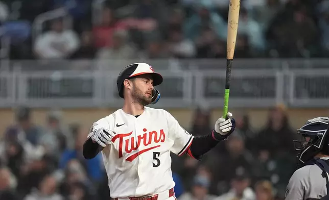 Minnesota Twins' Ryan Kreidler (5) reacts after striking out during the seventh inning of a baseball game against the New York Yankees, Monday, Sept. 14, 2026, in Minneapolis. (AP Photo/Abbie Parr)