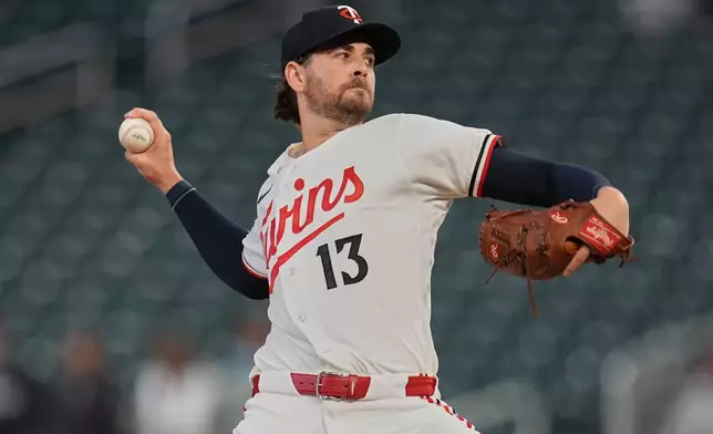 Minnesota Twins starting pitcher Dean Kremer delivers during the first inning of a baseball game against the New York Yankees, Monday, Sept. 14, 2026, in Minneapolis. (AP Photo/Abbie Parr)