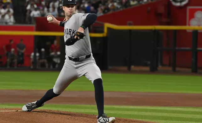 New York Yankees Cam Schlittler pitches during the first inning during the first inning of a baseball game against the Arizona Diamondbacks, Saturday, Sept. 19, 2026, in Phoenix. (AP Photo/Caitlin O'Hara)