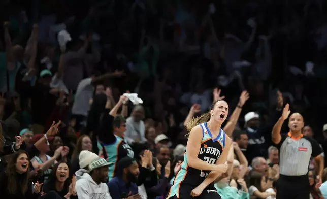 New York Liberty guard Sabrina Ionescu (20) reacts after scoring a three-point basket during the first half of Game 2 of a WNBA basketball first-round playoff series against the Minnesota Lynx, Tuesday, Sept. 29, 2026, in New York. (AP Photo/Heather Khalifa)