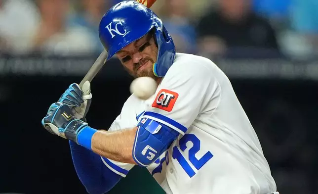 Kansas City Royals' Nick Loftin backs away from an inside pitch thrown by Arizona Diamondbacks pitcher Kade Stroud during the fourth inning of a baseball game Tuesday, Sept. 8, 2026, in Kansas City, Mo. (AP Photo/Charlie Riedel)